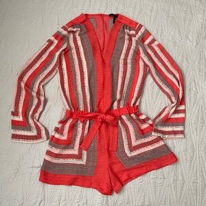 Beautiful BCBGMAXAZRIA long sleeve romper.